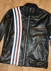 Front of black leather motorcycle jacket. Right side stripes of red, white and blue. Left side chest pocket and handwarmer pockets, all with ring pull zippers.