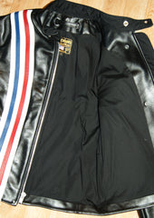 Open photo of black leather motorcycle jacket showing black rayon lining.