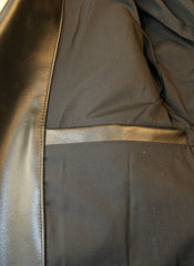 Interior pocket on right side.  Opens horizontally with no closure.